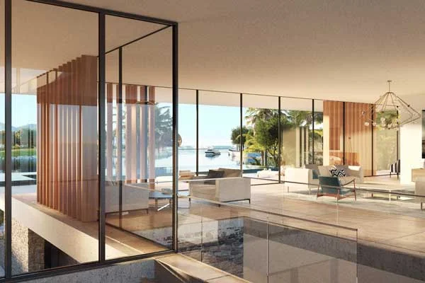 A landmark high-rise rising above the city at dusk — the scale and craft Ridgeway brings to every development.